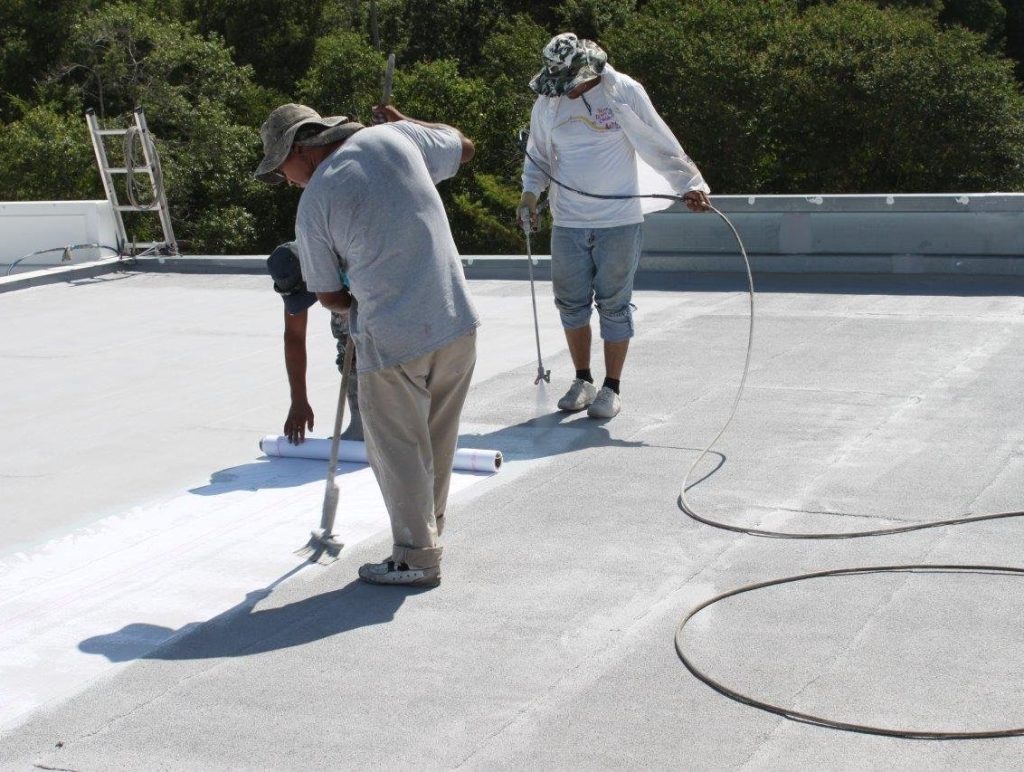 Additionalbaseandcloth0081 | engineered roofing systems Workers on a Commercial Roof